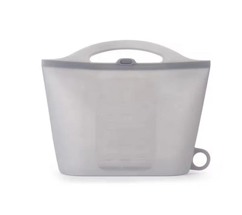 A translucent gray silicone collapsible water bottle with a handle and measurement markings, shown on a white background.